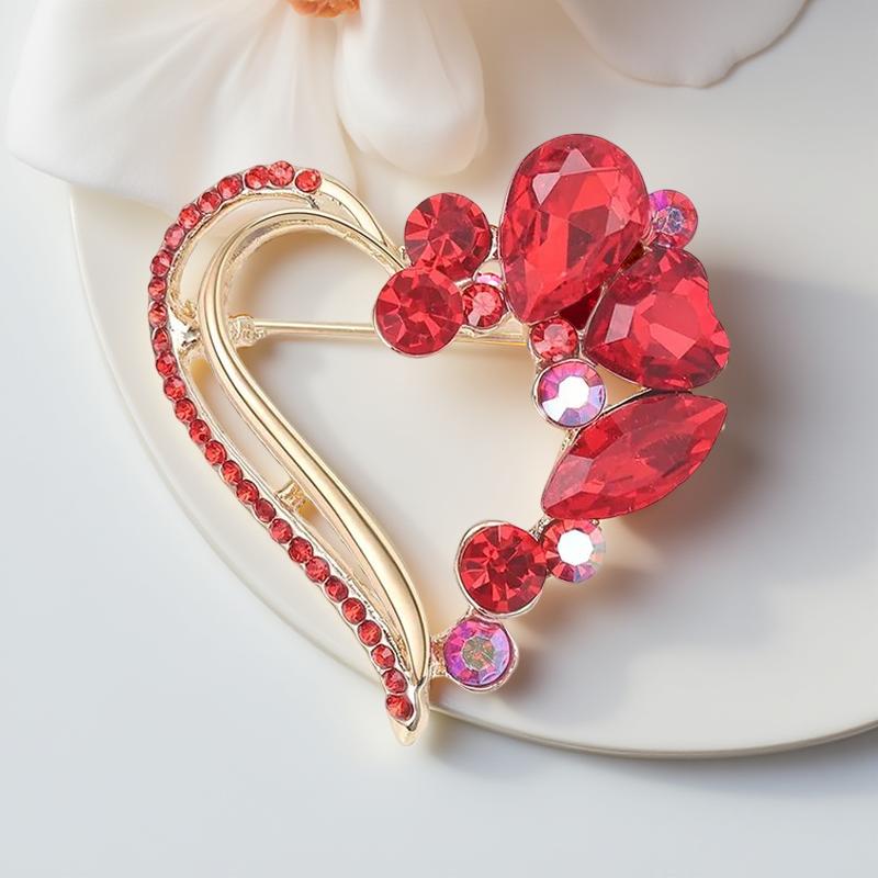 Оригинална брошка във формата на сърце от метална сплав и множество цветни кристали с различни големини и цветове