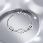 Ръчно изработена дамска стоманена гривна "Кара" в сребристо и австрийски кристали с красив детайл три звезди.